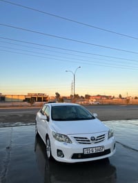 تۆیۆتا کڕۆلا بیکاشۆ مۆدێلی 2013 XLi سپی بەفری  176 هەزار ڕۆشتوە مەکینە...