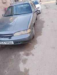 ابرنس فراشه رقم بغداد الدولي بسمي موديل 1996الون رصاصي محرك امسكر  كير...