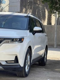 كيا كرنفال ٢٣ وارد امريكي بانزين فقط تبديل قطعه وحده سياره جاهزه من كل...