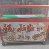 من رخصة الادمن المحترام عندي فاترينة فلافل استعمال قليل للبيع السعر ١٢...