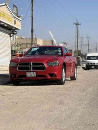 جارجر 2012 رقم بغداد أنكليزي  ماشيه ٢٢٠ شاشه كبيره  حداديه جديده  مكين...