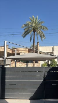 الباب • المظلة • بغداد