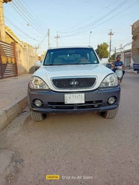 هونداي تريكان 2004 رقم بغداد محور محرك في في تي جيد السياره جاهزه من ك...