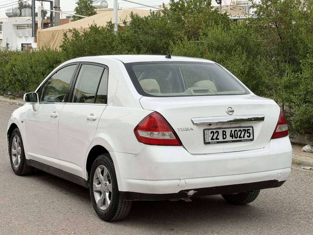 *********** نیسان تیدا مودیل 2010 گێڕ توماتیک ناو زەرد چوارجام کارەبا شاشە ئایپات 3 پارچەی بویاغە جەمپێکی پێشی هەیە ڕەقەم و سەنەوی نوێیە سعری 77 وەرەقە و مەجال شوێن هەولێر بنەسلاوە *********** أربيل, العراق
