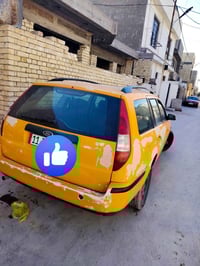 من فورد مونديو 2007 بسمي مصفره كامله رقم نكليزي 25 وبيه مجال بيع ومراو...