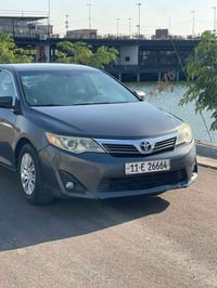 كامري وارد امريكي موديل ٢٠١٢ باسمي  حادث جاملغ خلفي وجنطه سياره بيه بس...