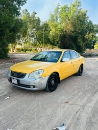 اوبتمه • ٢٠٠٦ • محرك ٢٤٠٠