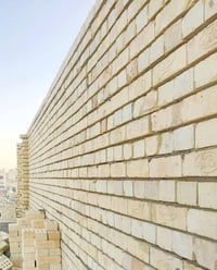 خلفة بناء • عامل بناء