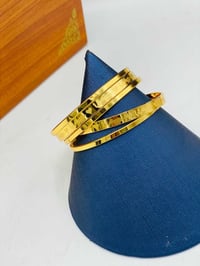 بتوت أطفال • ذهب برازيلي • قياس ٥٠ و٥٥