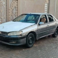 بيجو ٤٠٦ • مكينة كورلا • كتاب مزاد