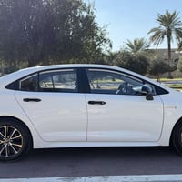 كورلا هايبرد 2024 الشكل الأمريكي العلامه الزركه  ماشيه 21  فول مواصفات...