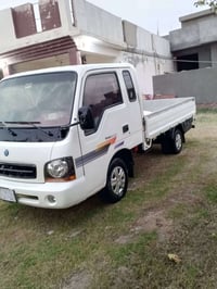 اخوان كيا ام عيون 2001 رقم بغداد بأسمي مكفولة من الضربه كير محرك جديد ...