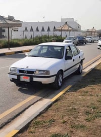 فيكترا ٩٢ • ابيض • تحويل بالموصل