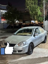 لانسر كويتي • ٢٠٠٩ • تحويل مباشر