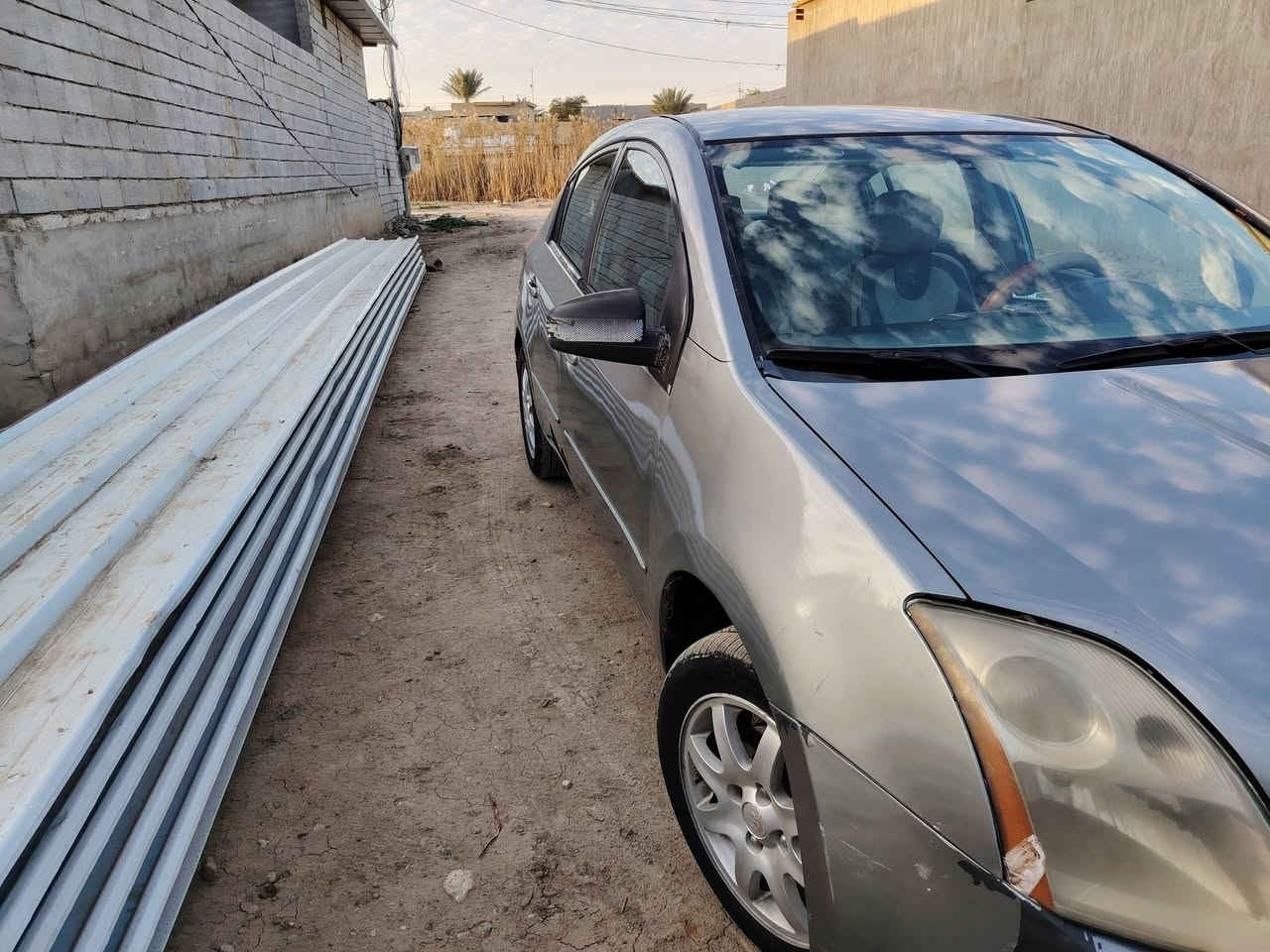 السلام عليكم نيسان سنتره 2007 حلوه ونظيفه مصبوغه للجماليه مكانها ديالى بلدروز رقم  ***********
