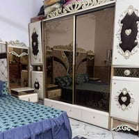غرفه نوم • اثاث خشبي