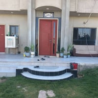 بيت طابقين • ٤٥٠م • أرض ملاصقة