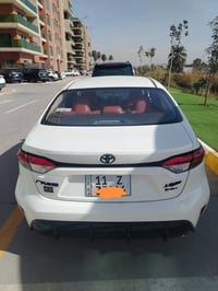 للبيع كورلا هايبرد S خليجي ٢٠٢٥ فول مواصفات داخل جلد مشمشي  كشن كهرباء...