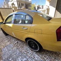 اكسنت 2011سياره جاهزه من كل النواحي محرك وگير شرط ظررها جاملغ الگدام ب...