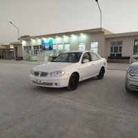 نيسان سني مزاد الداخلية مكفولة من الحادث بيها صبغ فقط السياره جاهزه كي...