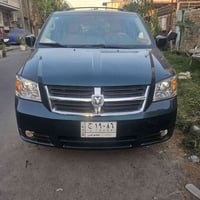دوج كرفان موديل ٢٠٠٩للبيع فقط بدون مراوس ابواب مع الجام كهرباء حادثها ...