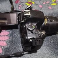 نيكون D5100 • شاحن وكيبل • بصرة