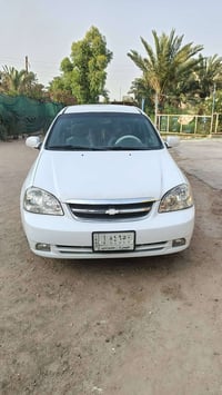 اوبترا 2011 سياره جديده تبريد ثلج سعر 68 حداديه حلوه نقال 07781269618