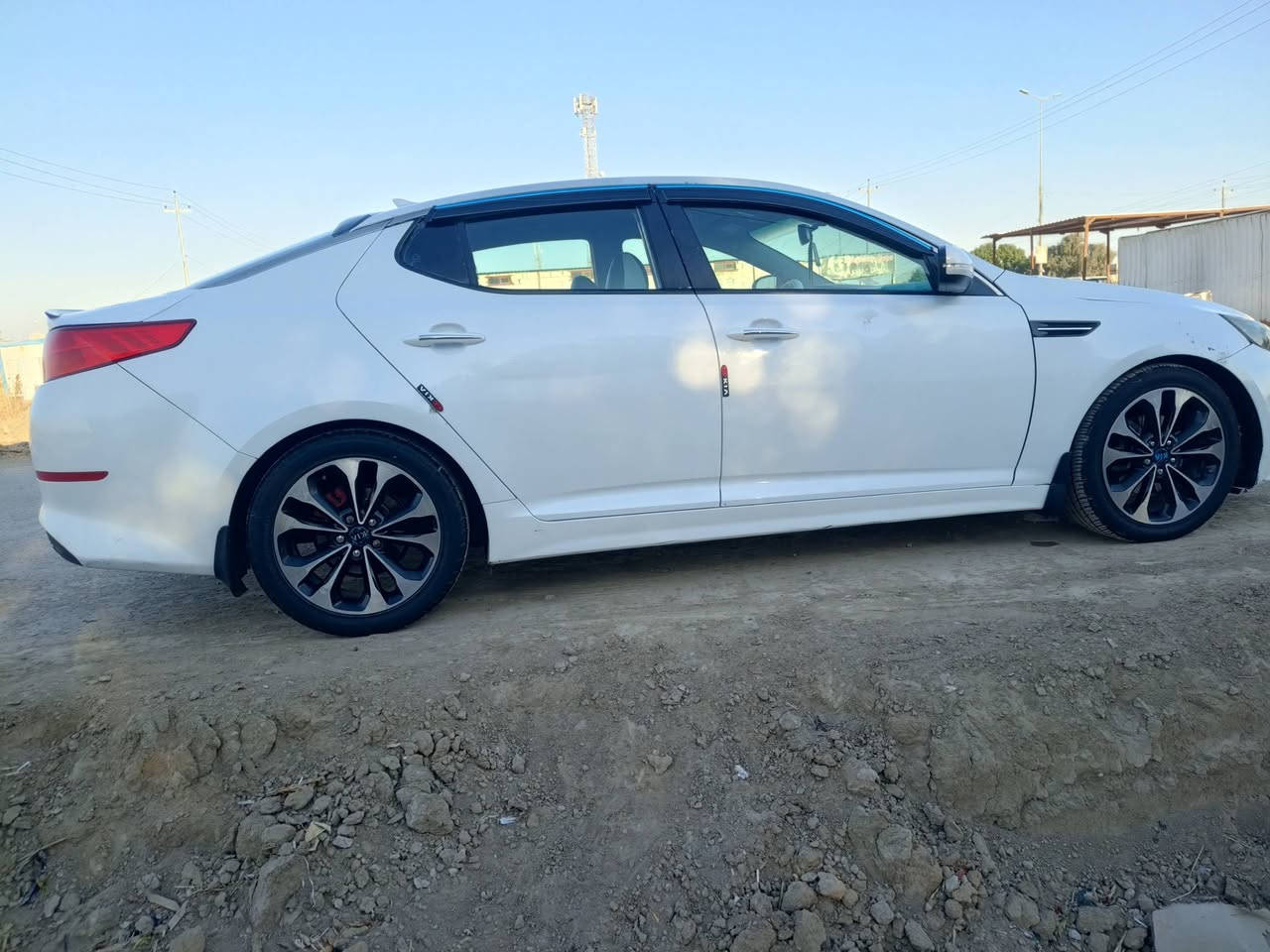 سلام عليكم اوبتيما موديل 2014امريكي ضربته شبر بجاملغ موضح بصوره لباقي كفاله عامه مكينه كير حداديه تخم تاير ترايك وين ماتريد رقم قادسيا  الرقم ***********
