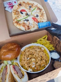 بوكس اليوم • بيتزا • زنجر