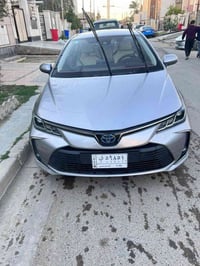 كورلا هايبرد  موديل ٢٢ وراد أمريكي سياره سونارها موجود بالصور بيها قطع...