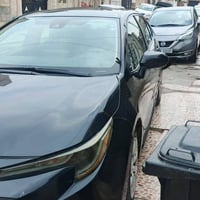 كورولا • أسود • بلا ايرباق