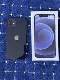 ايفون 12عادي 256 مكفول ضمان شهر نموذج m  07718495860 كارتونته ويا 335ب...