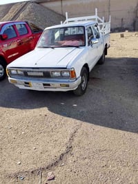 سياره للبيع سيارة نيسان دادچون  كير و محرك شرط دفتر كوبون بانزين ويا ش...