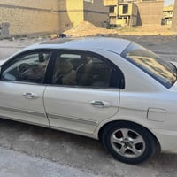 أوبتما 2004مصبوغه عام مكينه 2400 مكينه كير تبريد كله كفاله صدر جديد غر...