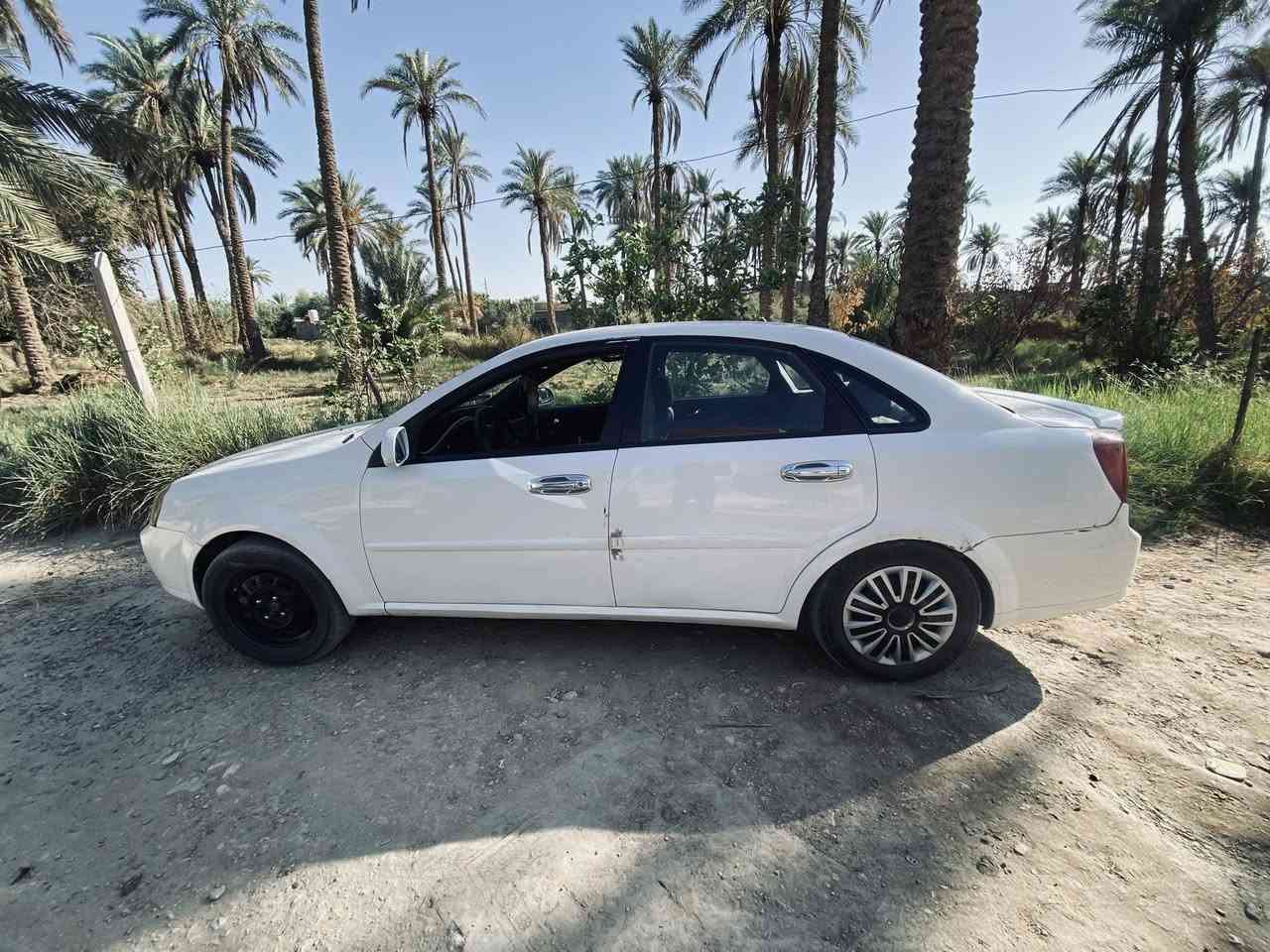 سياره للبيع أوبتره مديل 11كير ومحرك فول كلشي شغال بيها  سنويه صاقطه مكان بابل قرب العلويه شريفه بنت الحسن ***********)(السعر 80وبيها مجال)
