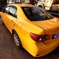 كورلا 2010كندي حادثها من كدام خفيف  السعر 110وبيها مجال  07726096517