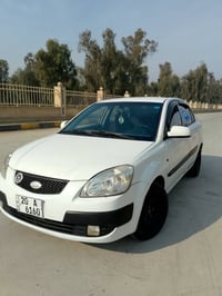 كيا ريو موديل 2006 كاربون بنزين بيها محرك 16 كير توماتيك بدون صبغ   ال...