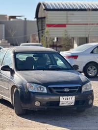 سيراتو ٢٠٠٦ • محرك وكير شرط • رقم أربيل