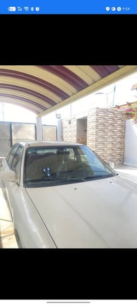 مازدا 323 • موتور ١.٦ • اوتوماتيك