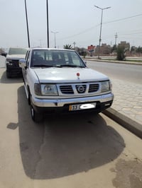 نيسان شبوط 2006 رقم ميسان انكليزي باسمي سنويه 30 سياره ماشيه 200الف مك...