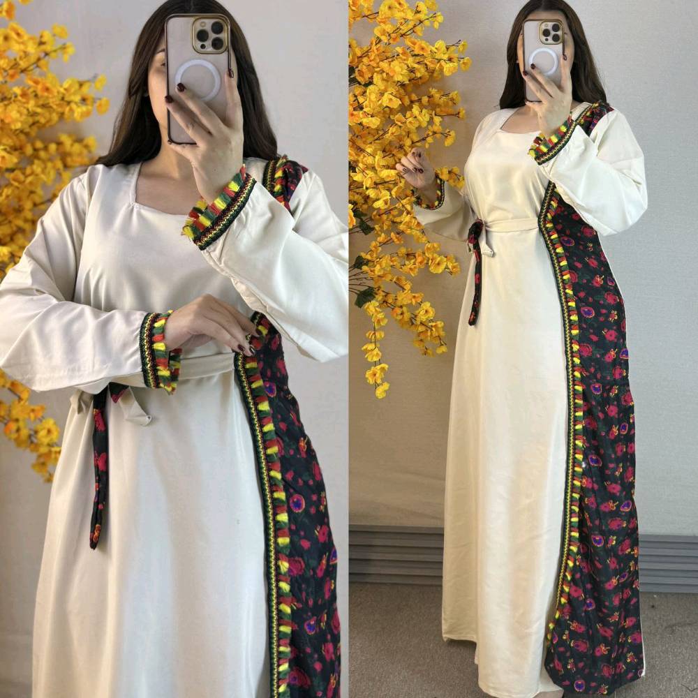 مجموعة من البيجامات والفساتين الجميلة المصممة بألوان ونقشات مميزة. البيجامات مصنوعة من قماش مريح وخفيف مناسب للنوم أو الاسترخاء في المنزل، بينما الفساتين تتميز بتفاصيل جذابة وزخارف تقليدية ملونة تضيف لمسة أنيقة ومميزة. سواء كنت تبحثين عن الراحة أو الإطلالة الفاخرة، هذه القطع تقدم الحل الأمثل لك.