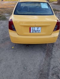 اوبترا موديل 2005 رقم بغداد جديد سعر 42 وبيه مجال كير عادي 07735340874