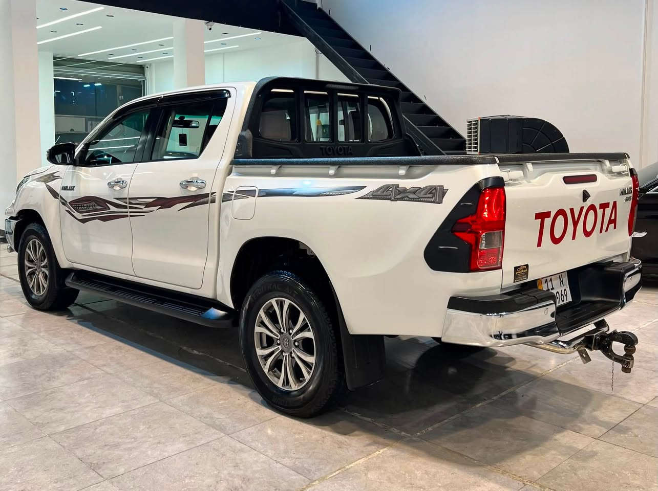 | تويوتا هايلوكس 2020 4×4 بصمة
مكفولة من الصبغ والتبديل والفتح كير محرك كفالة
💥 قوية.. عملية.. وجاهزة لكل الطرق 💥

السعر 267 ورقة وبي مجال 

✅ الموديل: 2020
✅ نظام الدفع: رباعي (4×4)
✅ المحرك: 2.7 لتر – 4 سلندر
✅ ناقل الحركة: أوتوماتيك 6 سرعات
✅ عدد المقاعد: 5

المواصفات:
✨ شاشة 8 إنش
✨ Apple CarPlay & Android Auto
✨ كاميرا خلفية
✨ حساسات أمامية وخلفية
✨ مصابيح LED
✨ مثبت سرعة
✨ نظام الثبات الإلكتروني (VSC)
✨ مساعد صعود المرتفعات (HAC)
✨ نظام ABS
✨ وسائد هوائية
✨ جنوط 17 إنش
✨ خزان وقود 80 لتر

متوفرة لدى معرض احمد الكبيسي لتجارة السيارات 

📍عنوان بغداد• حي جامعة • نفق الشرطة 

📞 للاستفسار والاتصال:
***********
***********
