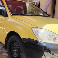 لانسر بومة 2010 لبيع السيارة مكفولة من الضربة والصبغ   رقم انكليزي بغد...
