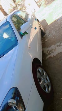 سياره للبيع اوبتيما 2008 خليجيه السياره بالكيس محرك 1400 شرط السونار ا...