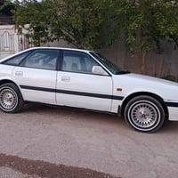 مازدا ١٩٩٠ • رقم جديد دولي • بطاقة بنزين