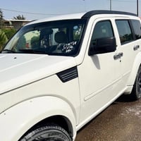 دوج نيترو 2007 رقم سليمانيه  مكانها بغداد السيارة جاهزة من كلشي مابيها...