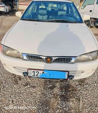 بروتون 2002 ويرا للبيع  جاملغ الخلفي جهة السائق صبغ فقط  كير اوتو  محر...