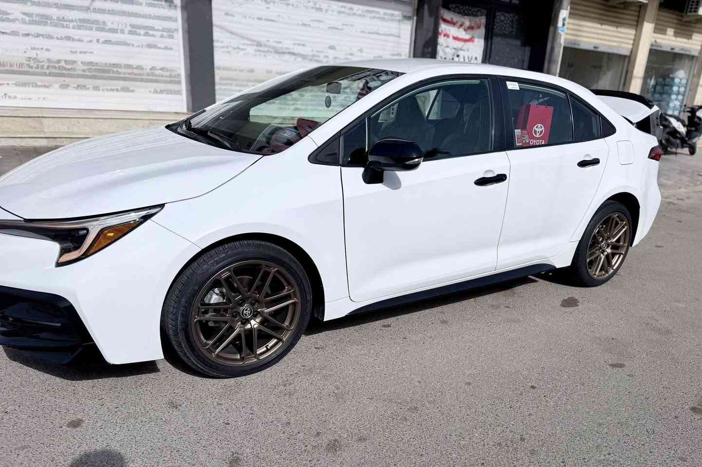 🚗 للبيع — Toyota Corolla SE
محرك 2000 
كير 10 نمر 
( وارد امريكي مو صيني 
✨ الحالة: جديدة جداً
📏 الممشى: 9000
حادث جاملغ خلفي وباب خلف السايق بدون دواخل 
⚙️ المواصفات:
 • بصمة
 • دخول ذكي
 • رادار أمامي
 • رادار جانب
 •لايت LED
 • بك لايت LED
 • ويلات golden  TDR رياضي 

 • نظام صوت JBL دمام خلفي مع التكم 
 • شاشة نظام Apple CarPlay
 • Auto Stop (توفير وقود)
 • سايد بريك بصمة (الكتروني)
 • Auto Hold
 • داخلية مطرزة باللون الأحمر

رقم اربيل مميز 
بسمي تحويل شرط 
السعر 168💵
📍 مكان السيارة: بغداد الصليخ 

📞 للاستفسار:


**إذا كنت صاحب هذا الإعلان وتريد حذفه لأي سبب، رجاءا أرسل رسالة إلى الدعم الفني**