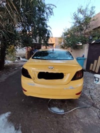 أكسنت • ٢٠١٣ • رقم بغداد